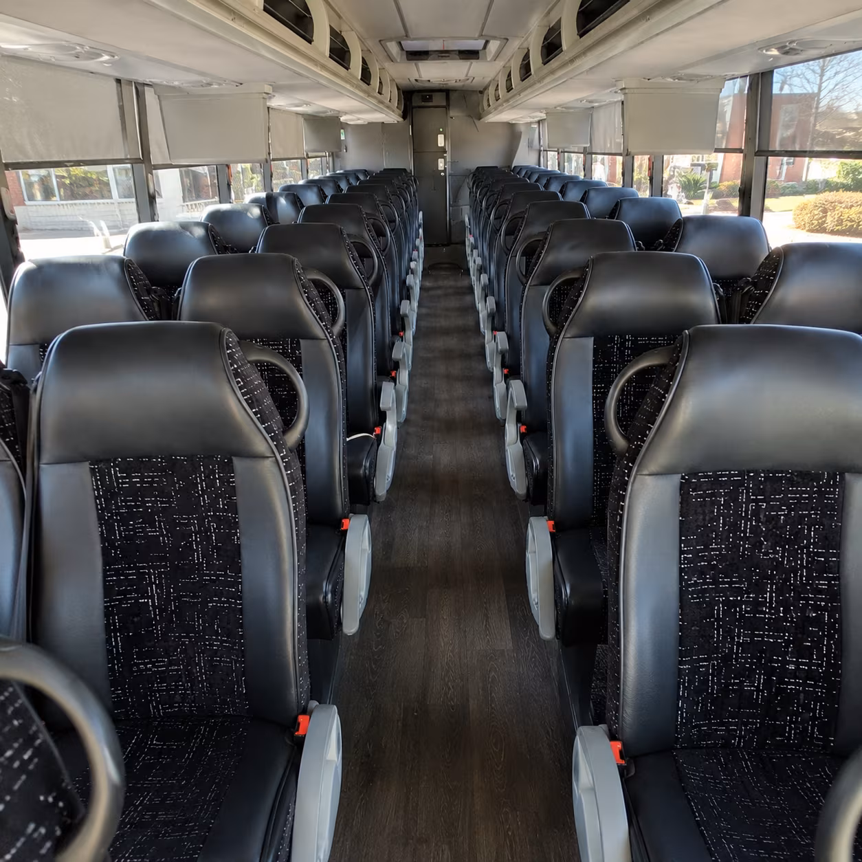 lansing 54 passenger charter bus inside