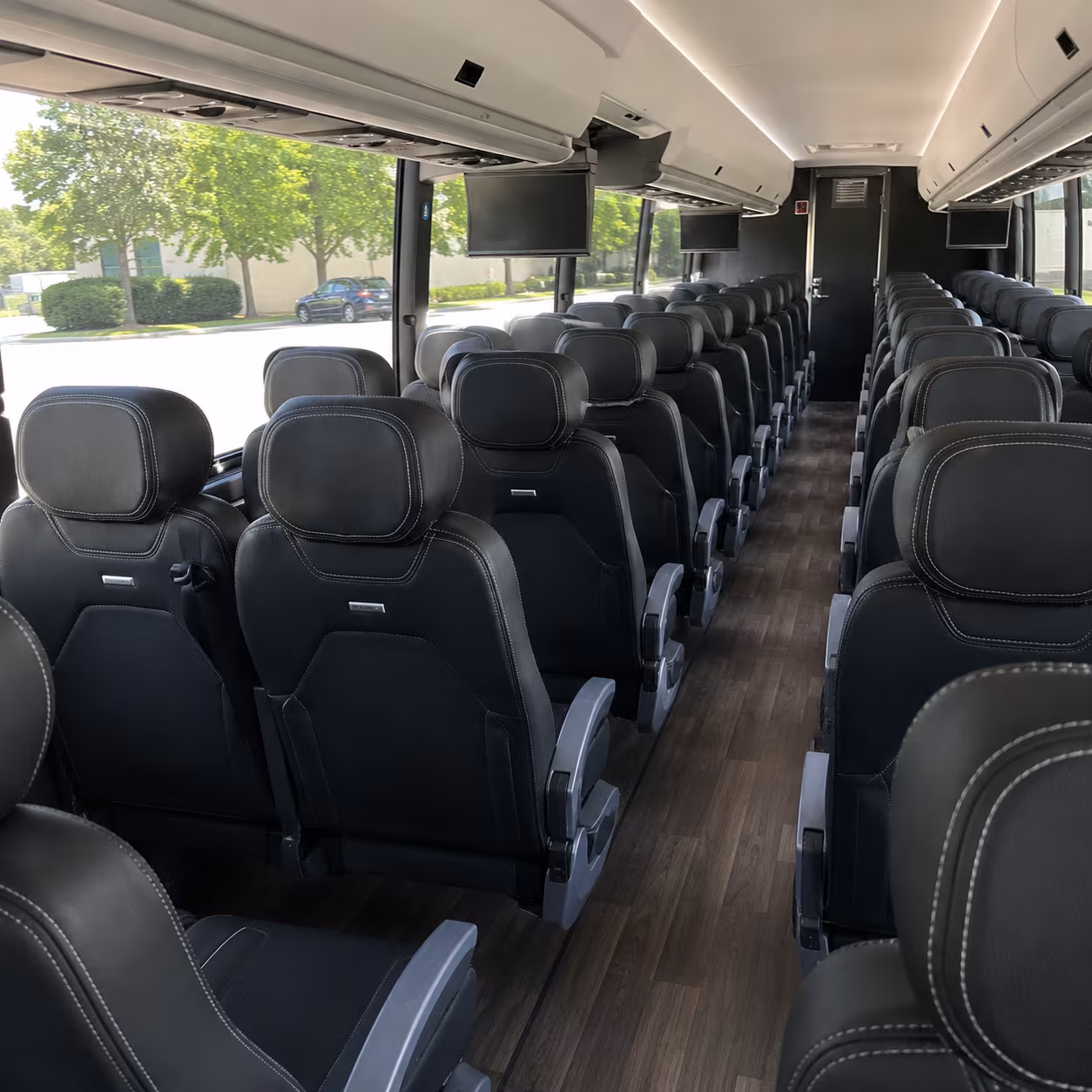 lansing sporting event transportation onboard seating
