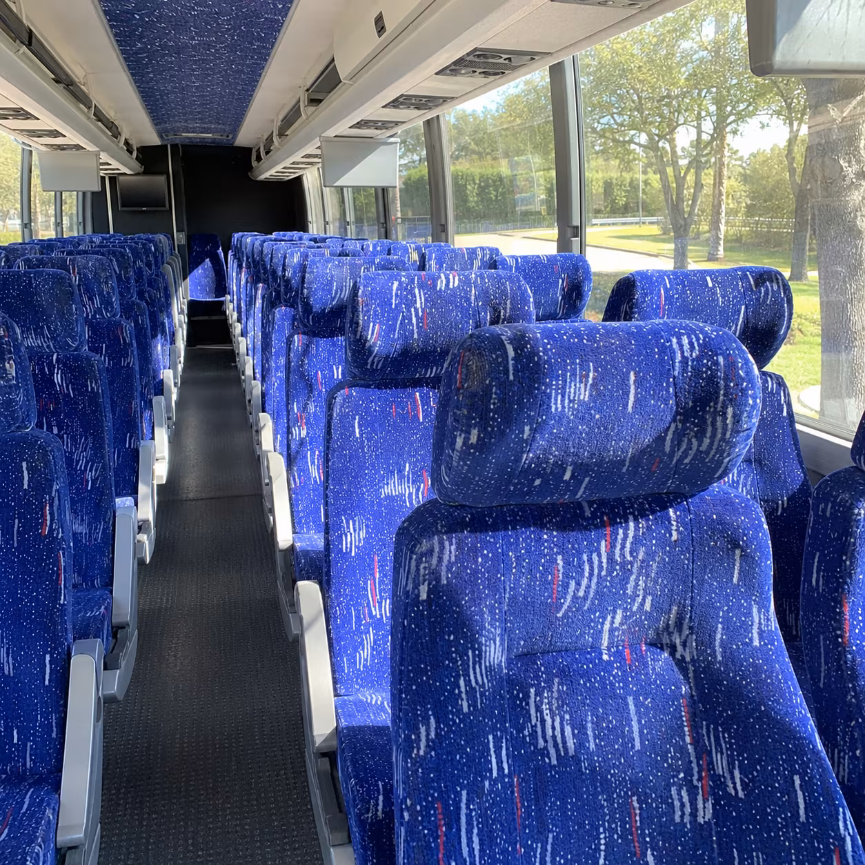 long distance charter buses for michigan state alumni and away game travel